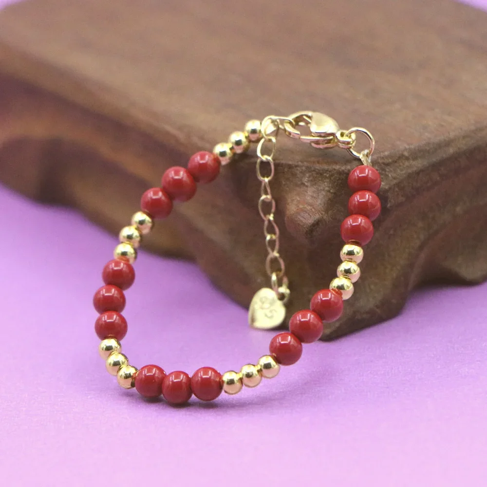 Bracelet à breloques rouge pou - Yoga Fitness Tracker avis et prix